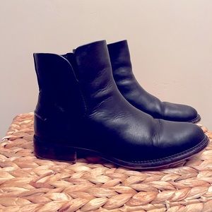 Franco Sarto black leather zip up ankle boots.